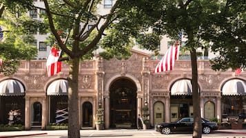 A historic building with ornate architecture, large windows, and a prominent entrance.