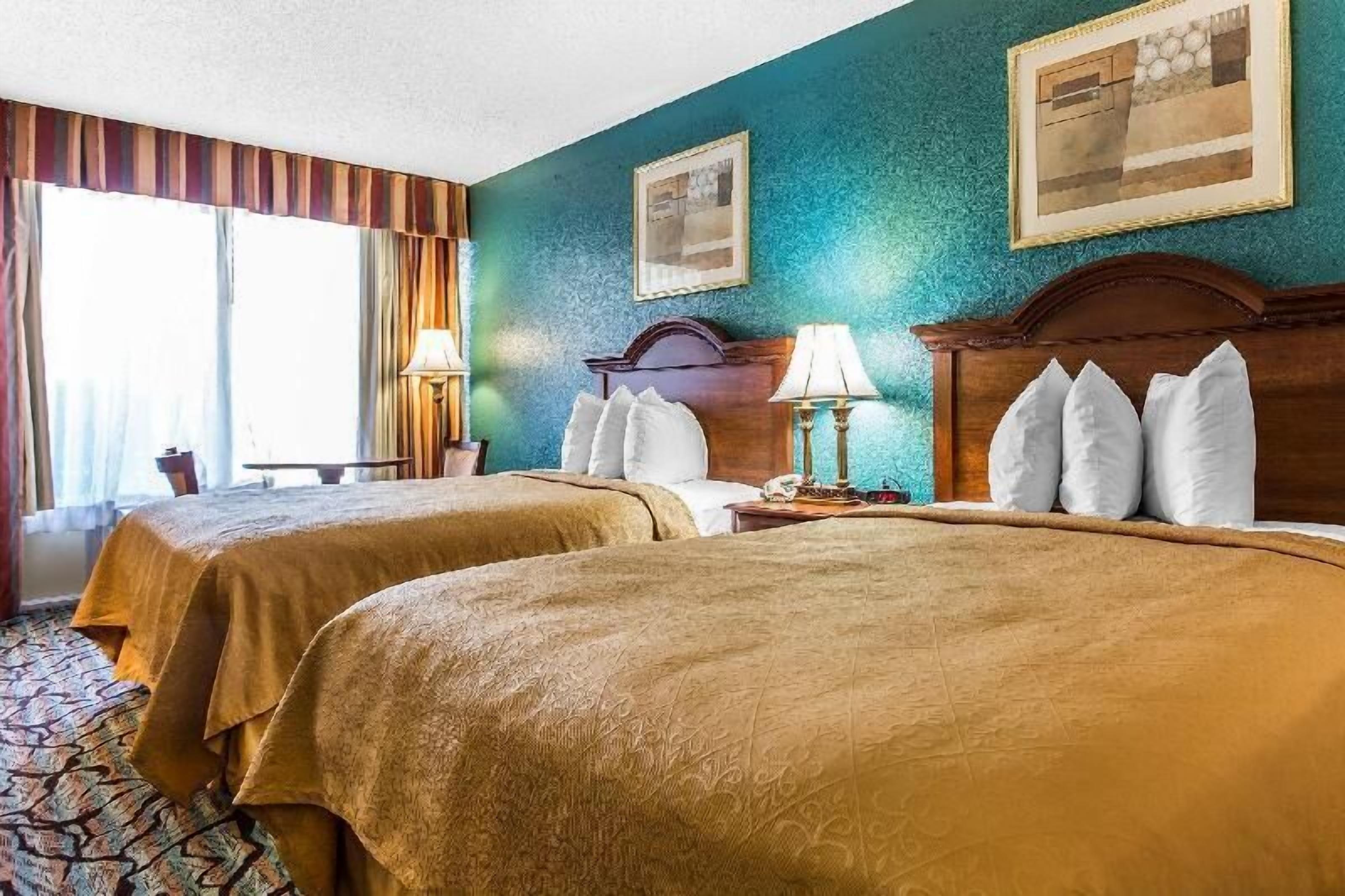 Blackout drapes, iron/ironing board, free cribs/infant beds, free WiFi