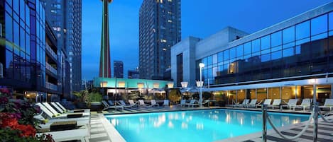 Seasonal outdoor pool, open 7:00 AM to 10:00 PM, pool loungers