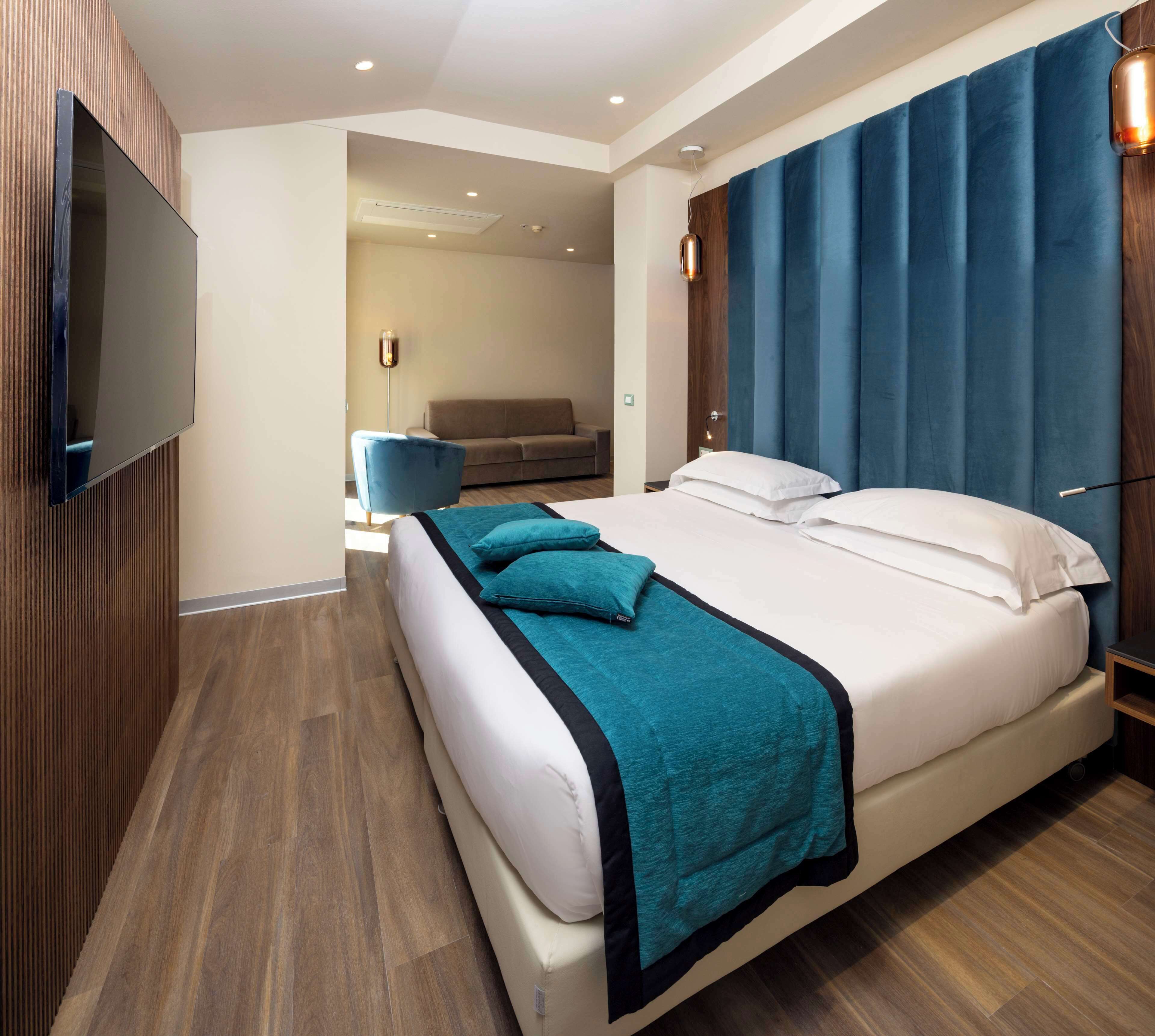 junior suite, multiple beds, non smoking, city view | premium bedding, down duvets, minibar, in-room safe