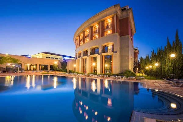 Seasonal outdoor pool, pool umbrellas, pool loungers