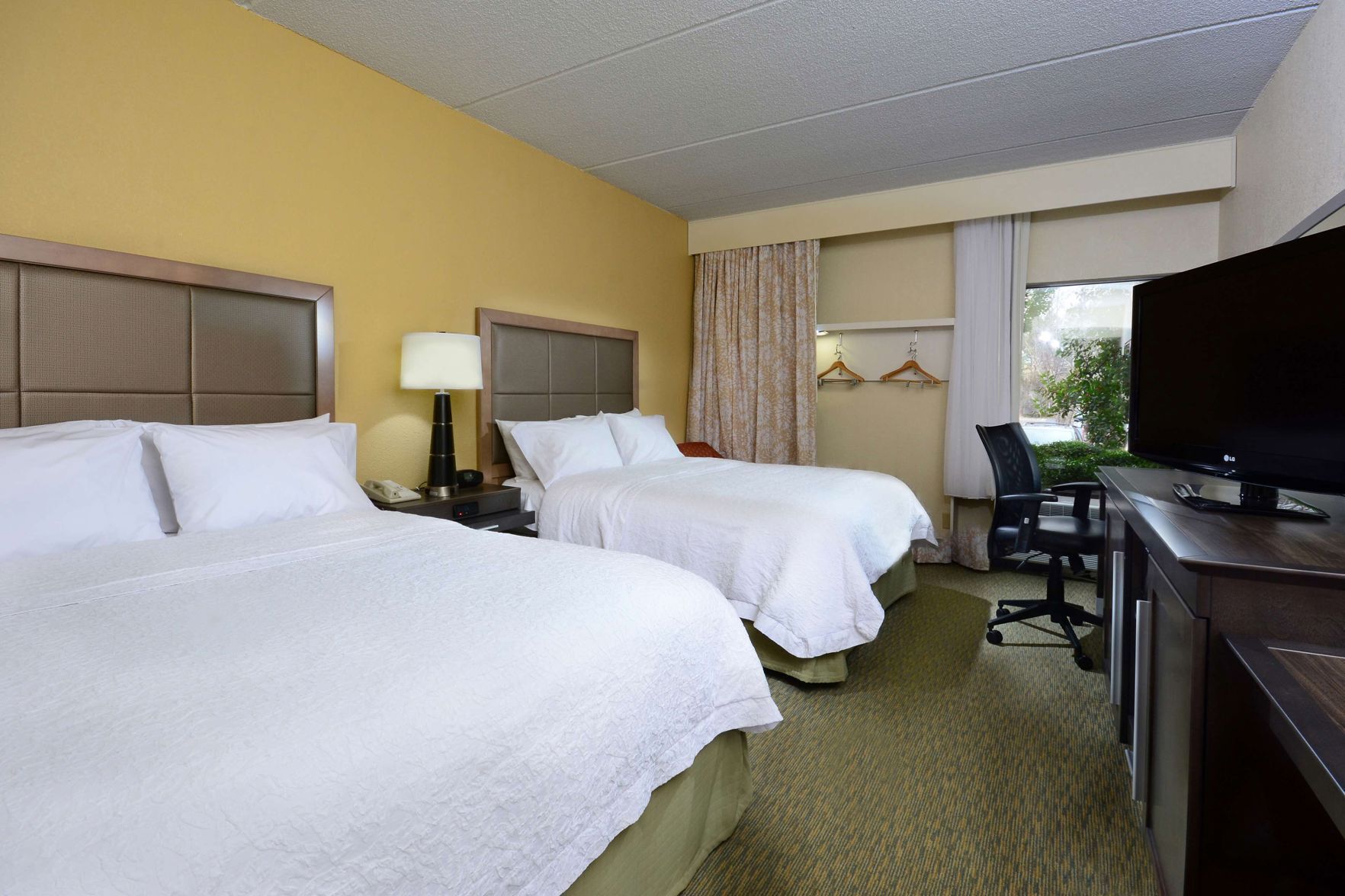 Premium bedding, pillow-top beds, in-room safe, desk