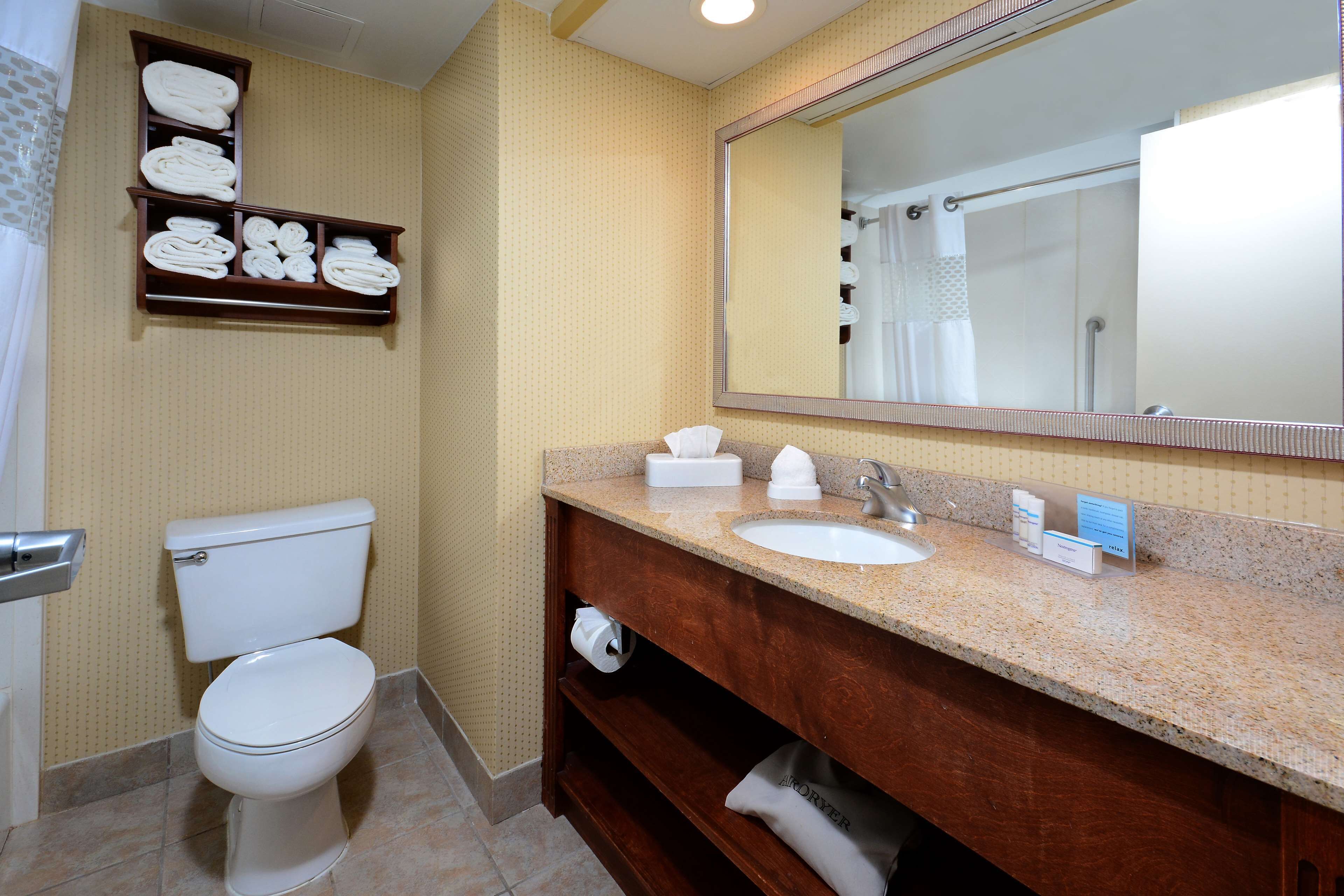 eco-friendly toiletries, hair dryer, towels