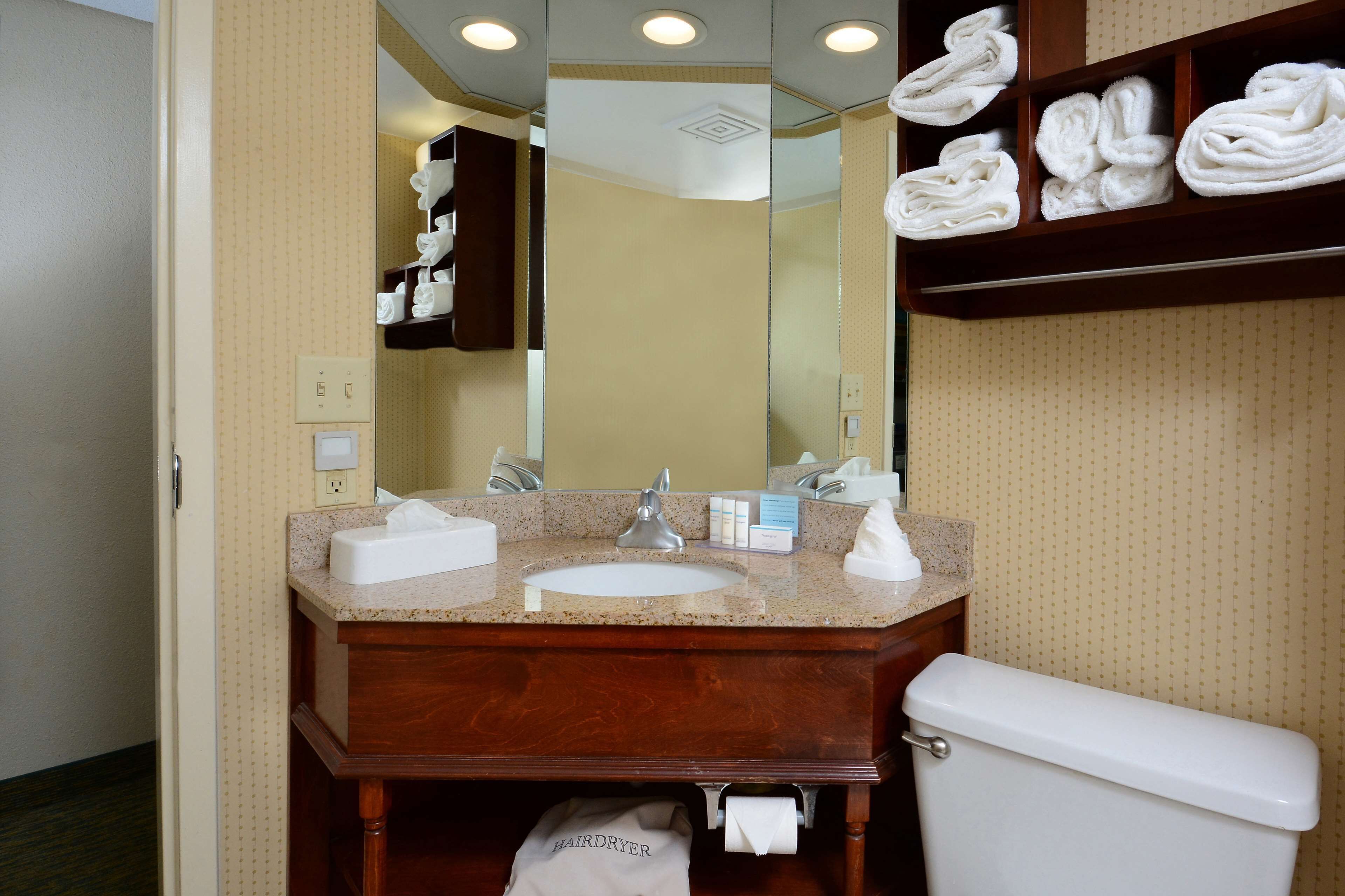 eco-friendly toiletries, hair dryer, towels