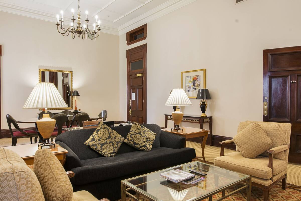 suite, 1 king bed | living area | 55-inch lcd tv with cable channels, tv, pay films