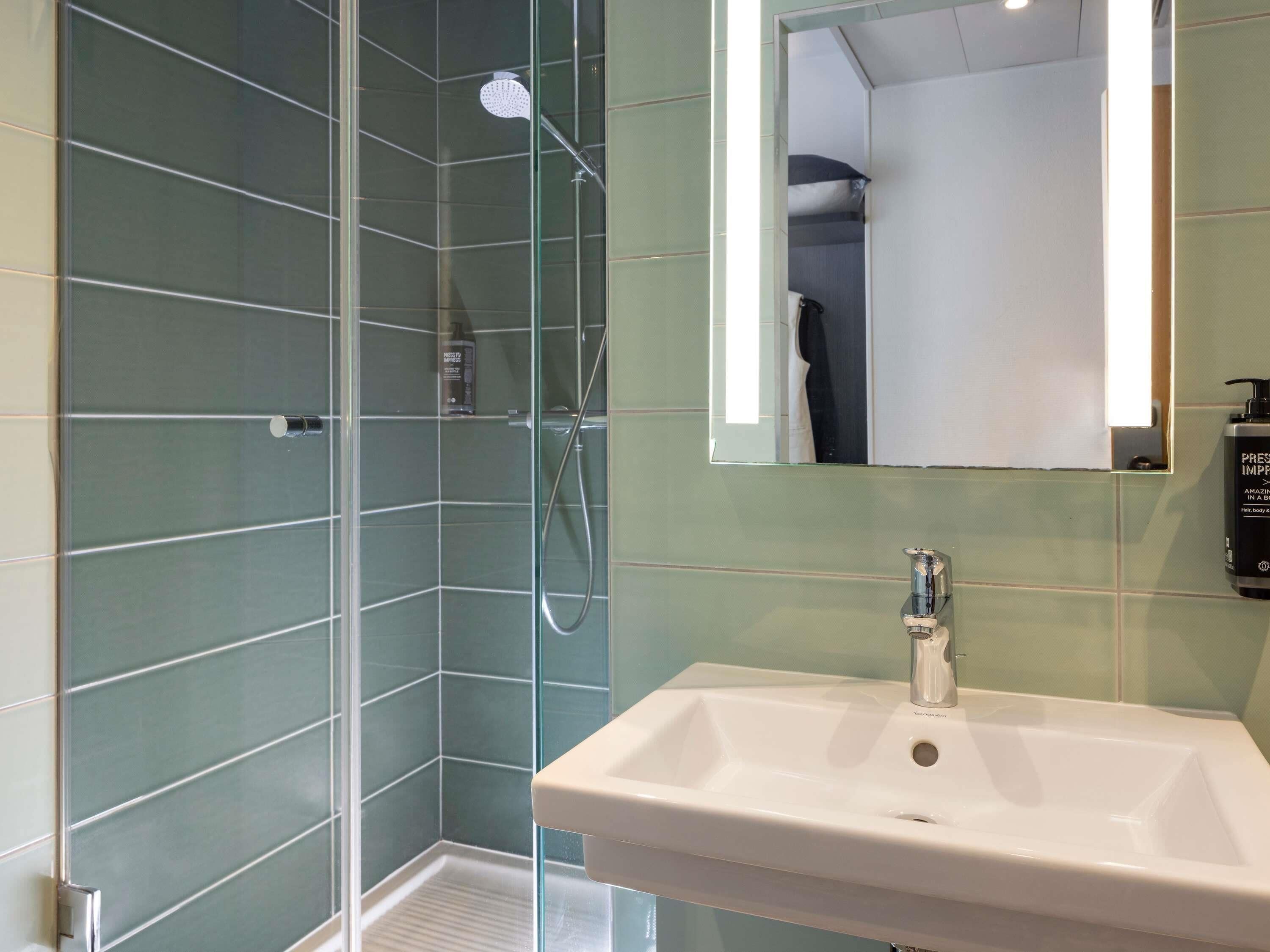 standard room, 2 single beds | bathroom | eco-friendly toiletries, hair dryer, towels
