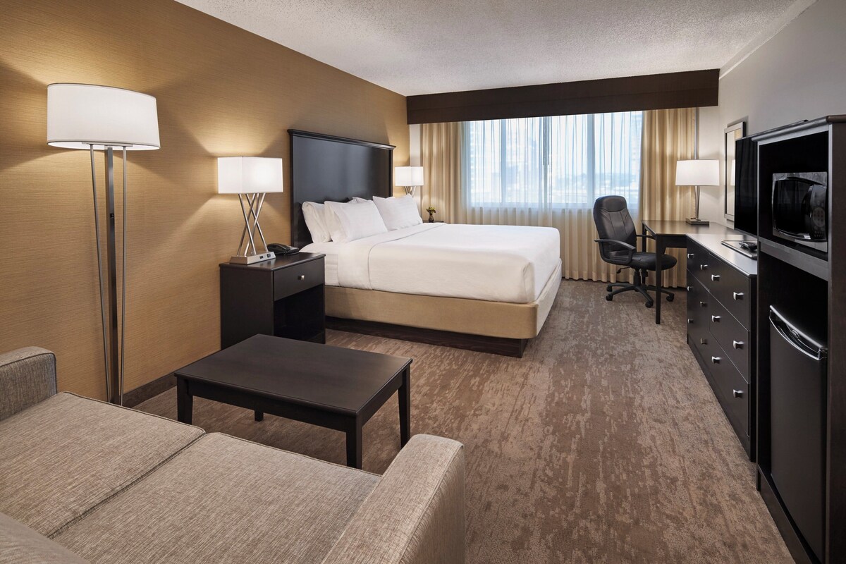 Standard Room, 1 King Bed with Sofa bed | Pillowtop beds, in-room safe, desk, blackout drapes
