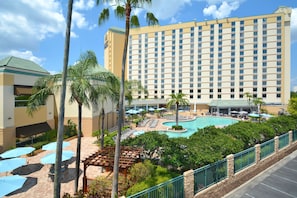 Outdoor pool, open 8:00 AM to midnight, pool umbrellas, pool loungers