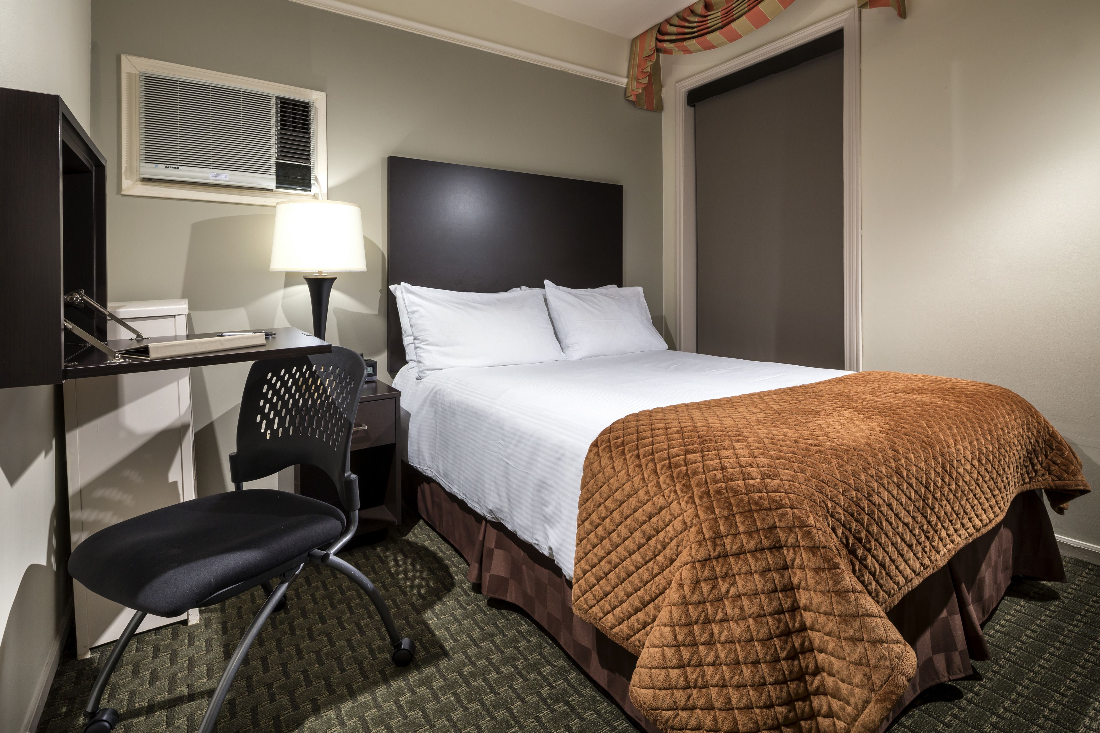 basic studio, 1 queen bed | premium bedding, minibar, desk, blackout curtains