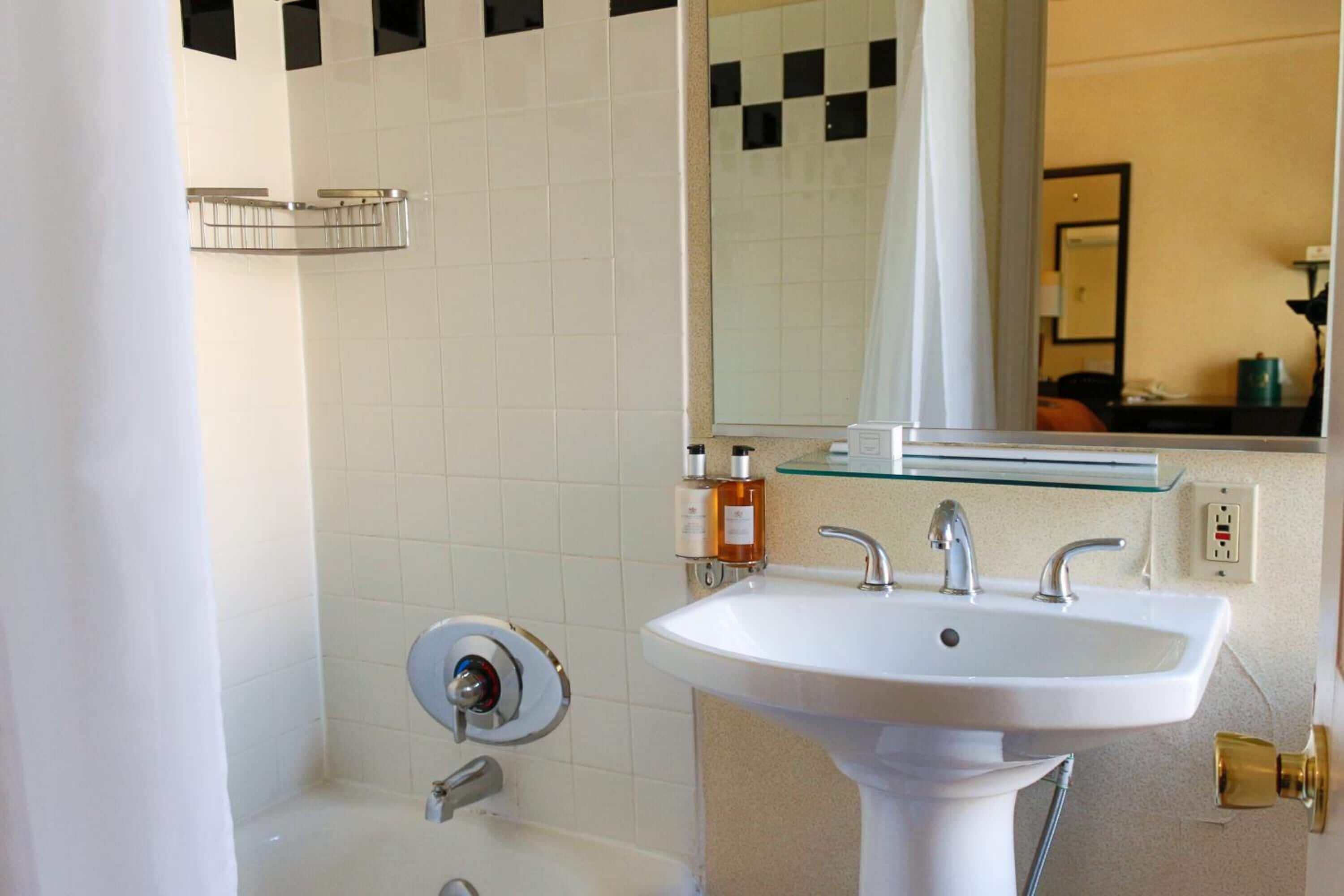 combined shower/bathtub, free toiletries, hair dryer, bathrobes