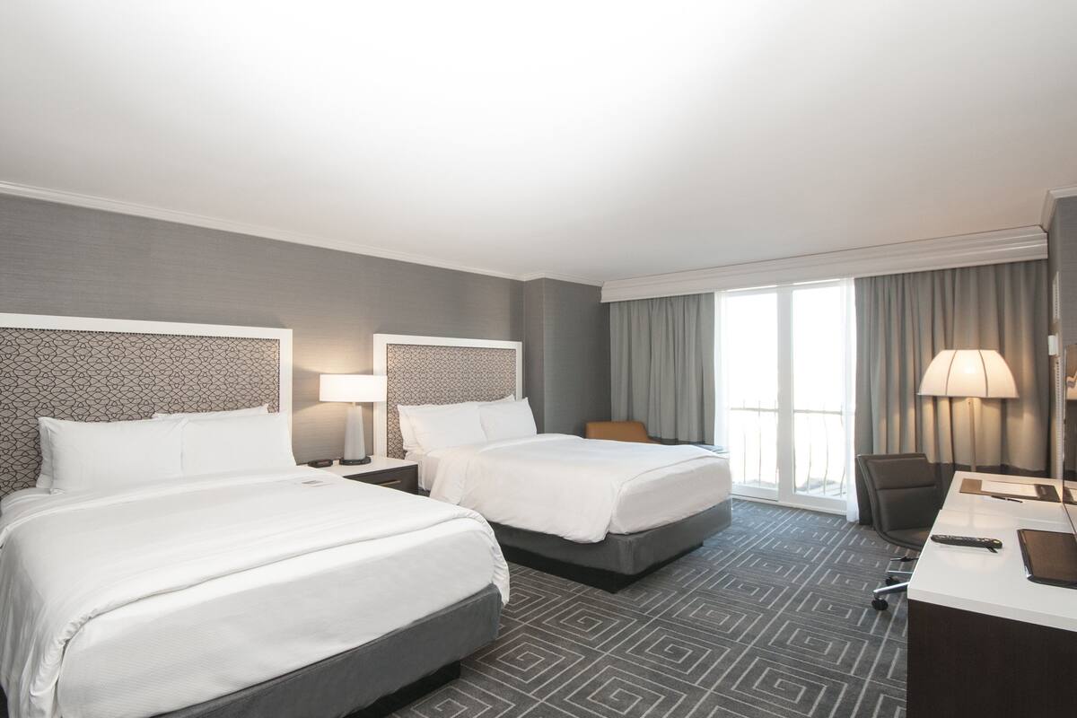 Premium bedding, down duvets, in-room safe, desk