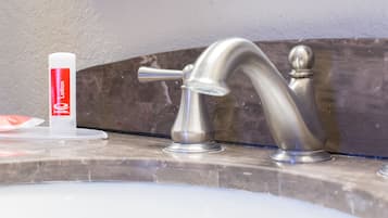 Suite, 1 King Bed with Sofa bed, Non Smoking | Bathroom sink