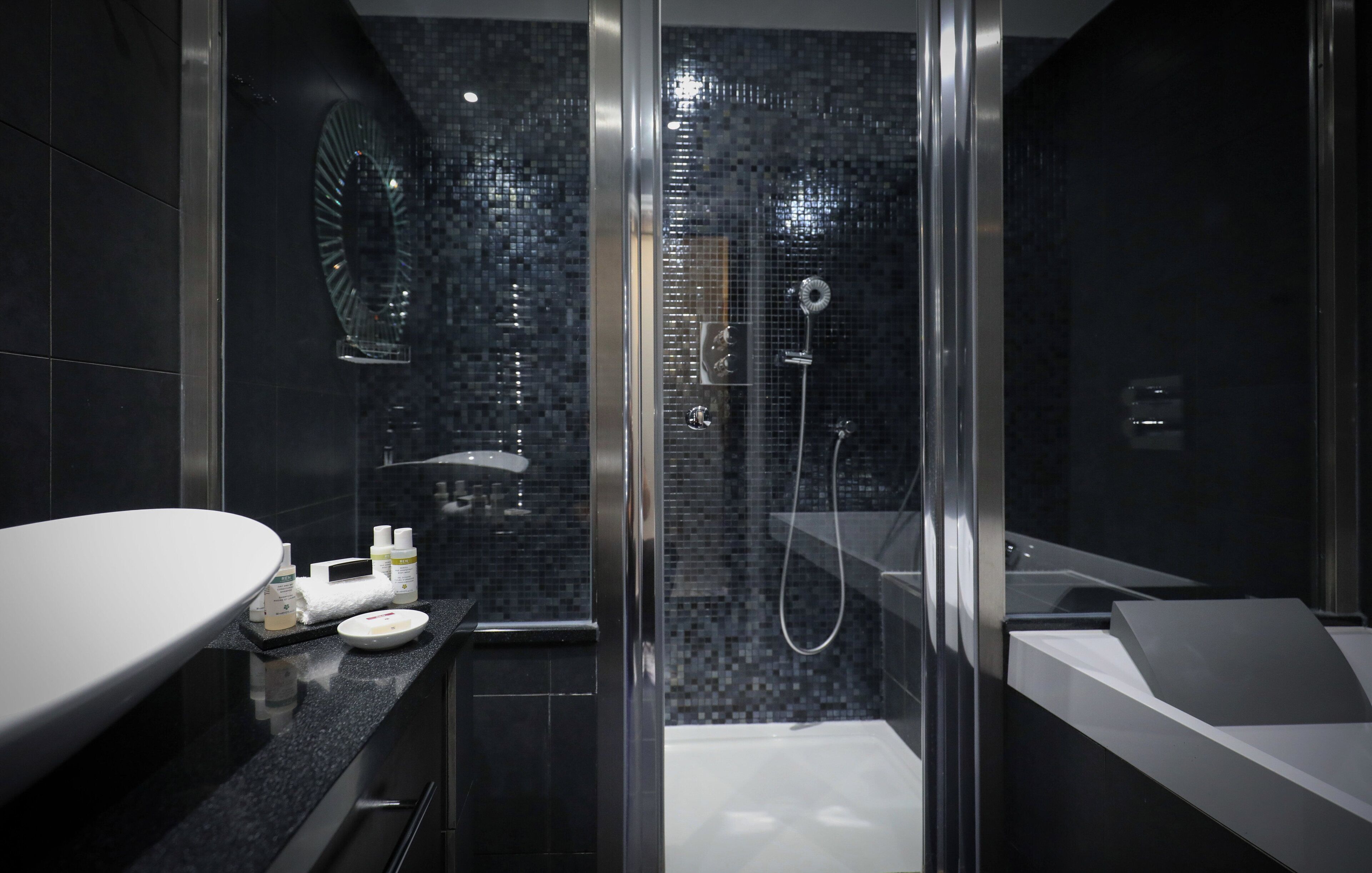 park view signature suite | bathroom | eco-friendly toiletries, hair dryer, towels, soap