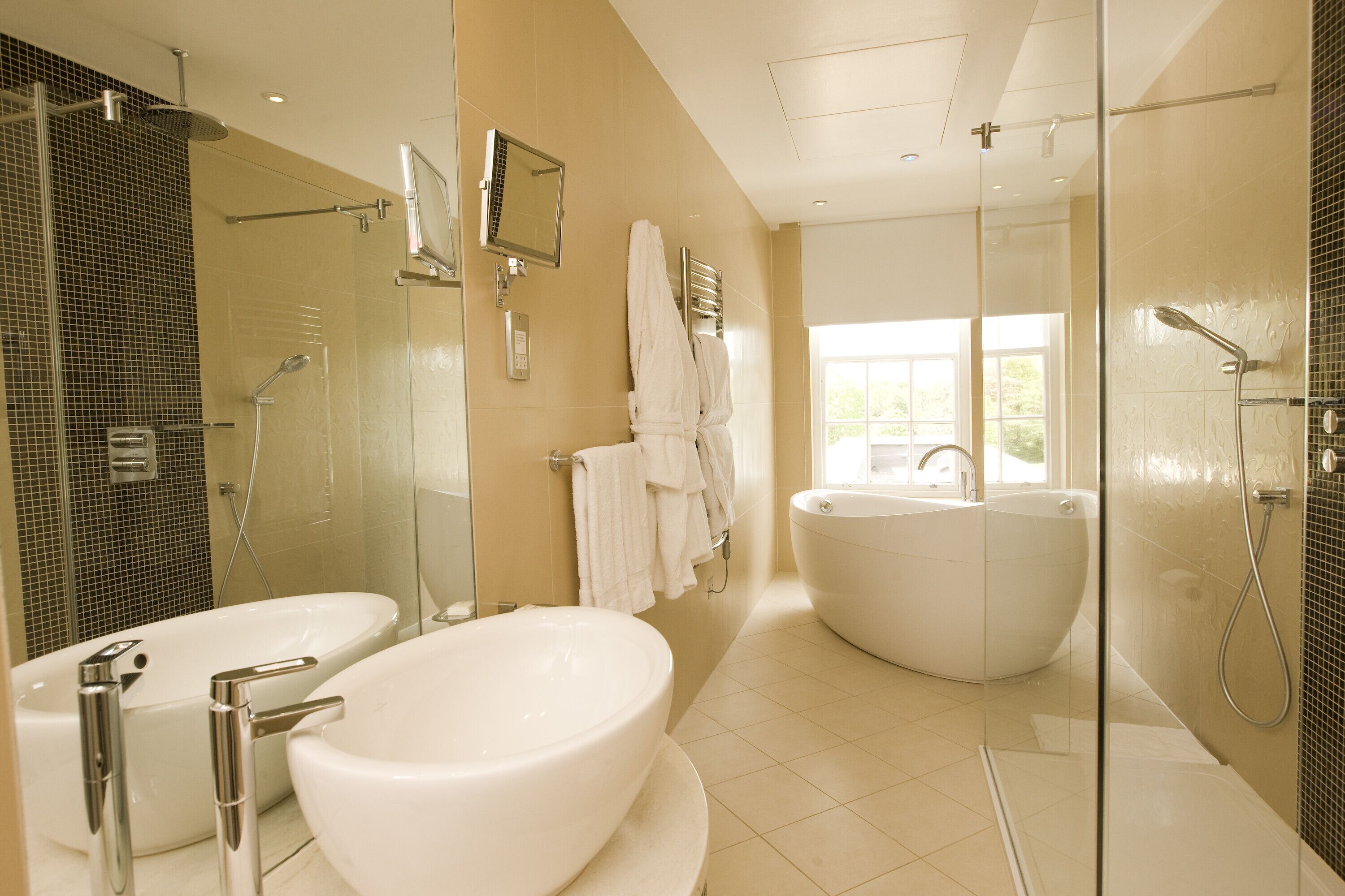 suite | bathroom | eco-friendly toiletries, hair dryer, towels, soap