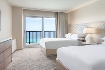 Executive Suite, 1 Bedroom (1 King or 2 Doubles) | Hypo-allergenic bedding, down comforters, pillowtop beds, in-room safe at Sheraton Waikiki Beach Resort
