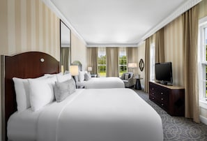 Down duvets, pillow-top beds, in-room safe, desk