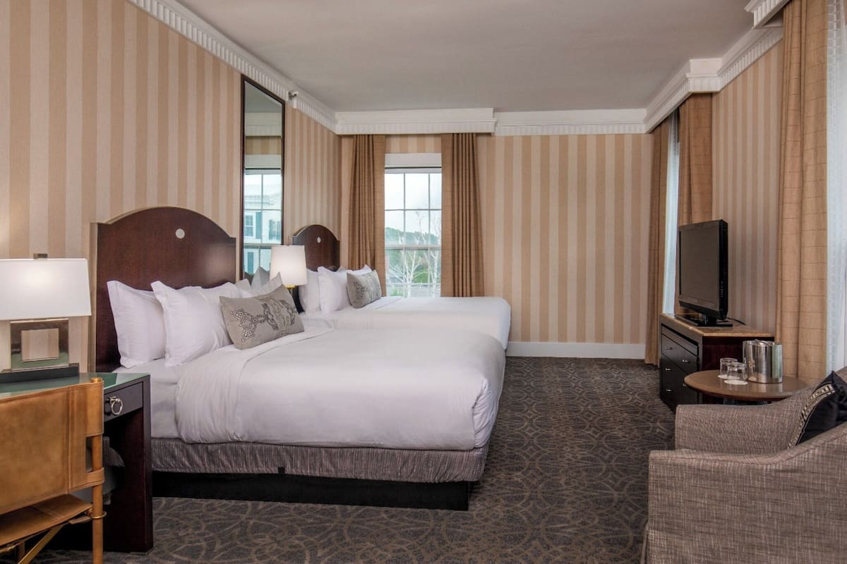 Down duvets, pillow-top beds, in-room safe, desk
