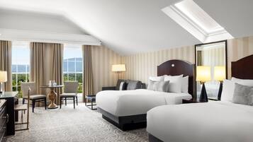 Edredón, camas con pillow-top y caja de seguridad en la habitación