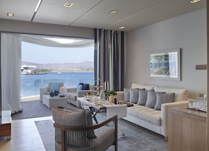 3 bars/lounges, poolside bar, beach bar