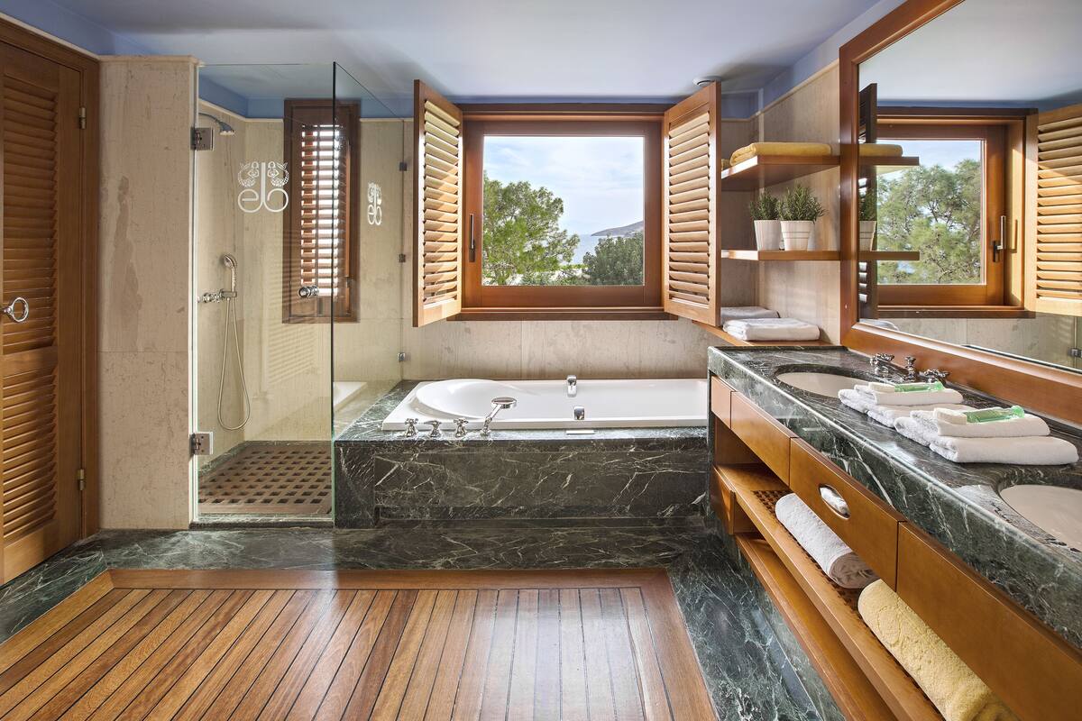 premium hotel or bungalow suite sew view | bathroom | free toiletries, hair dryer, bathrobes, slippers