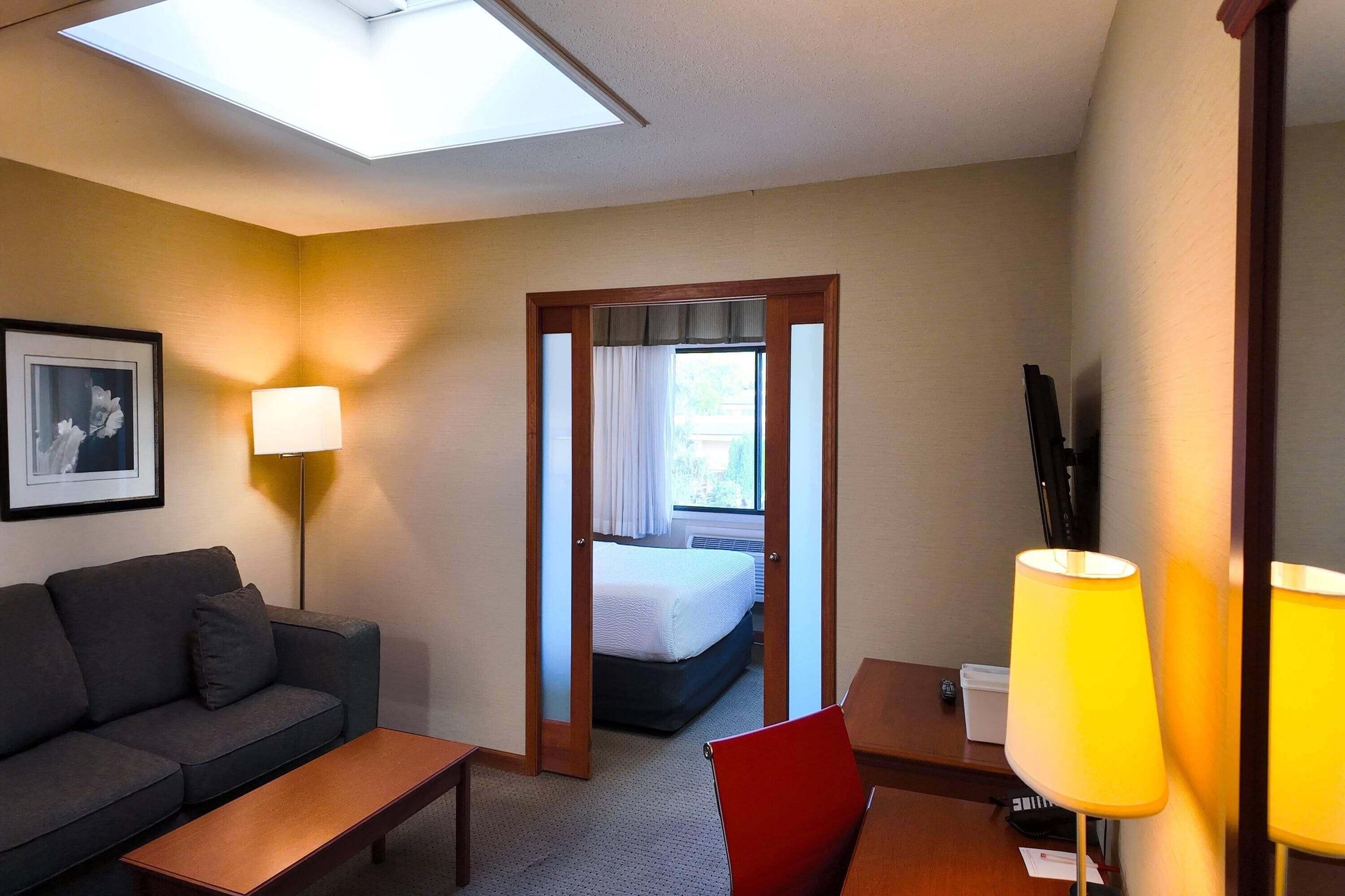 Suite, 1 Bedroom, Non Smoking | In-room safe, desk, blackout curtains, iron/ironing board
