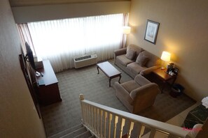 Loft Suite with 1 King Bed and Sofa Bed | In-room safe, desk, blackout drapes, iron/ironing board