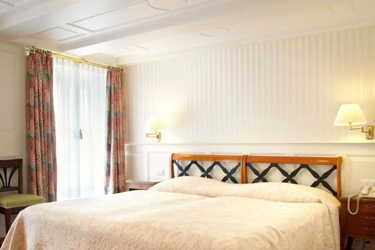 Hypo-allergenic bedding, down duvets, minibar, in-room safe