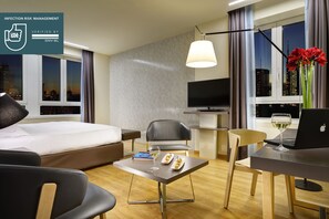 Hypo-allergenic bedding, down comforters, minibar, in-room safe