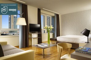 Hypo-allergenic bedding, down comforters, minibar, in-room safe