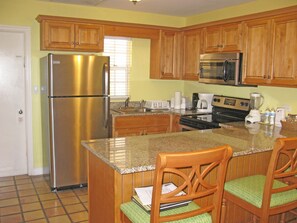 Microwave, dishwasher, coffee/tea maker, cookware/dishes/utensils
