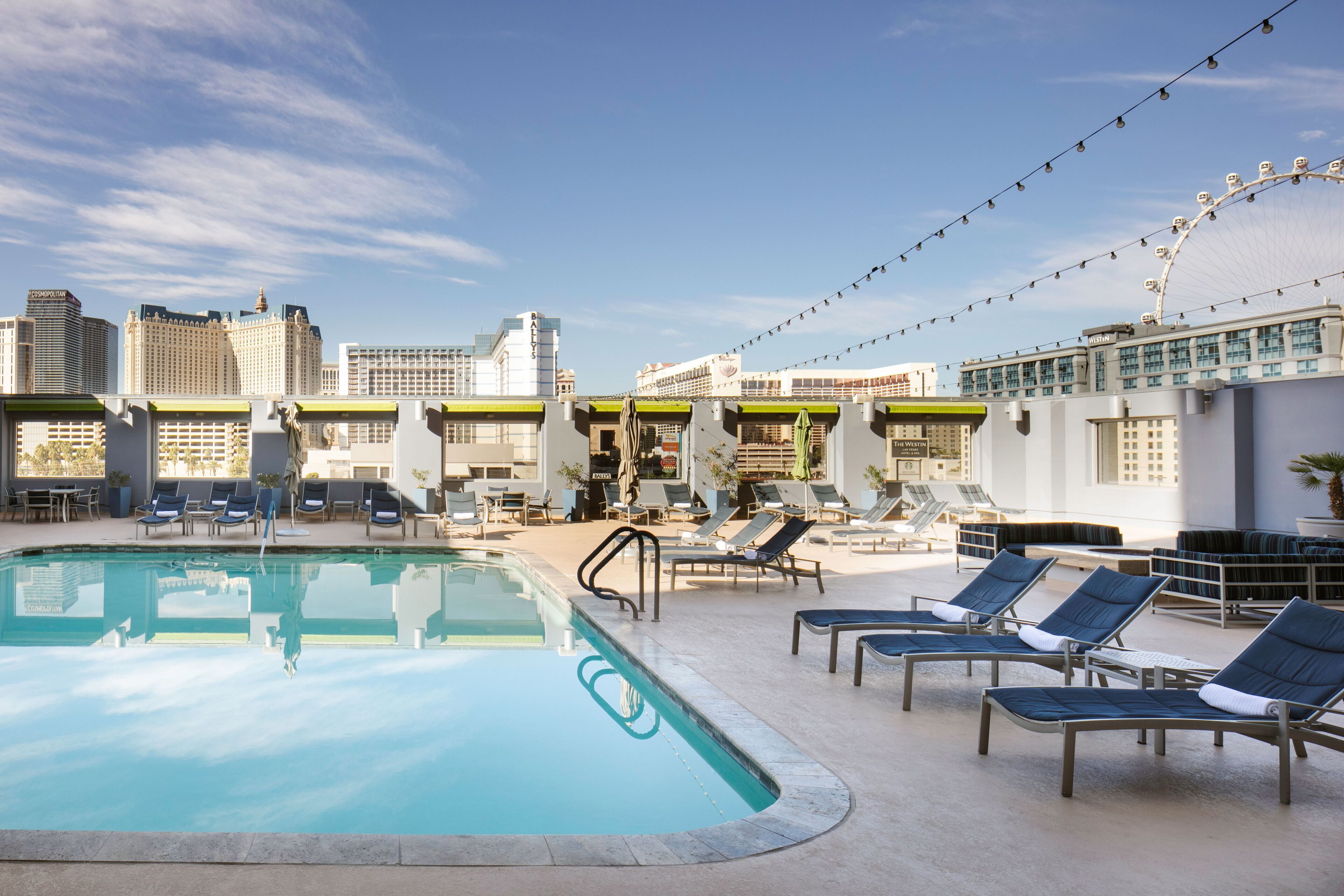 indoor pool, outdoor pool, pool umbrellas, pool loungers