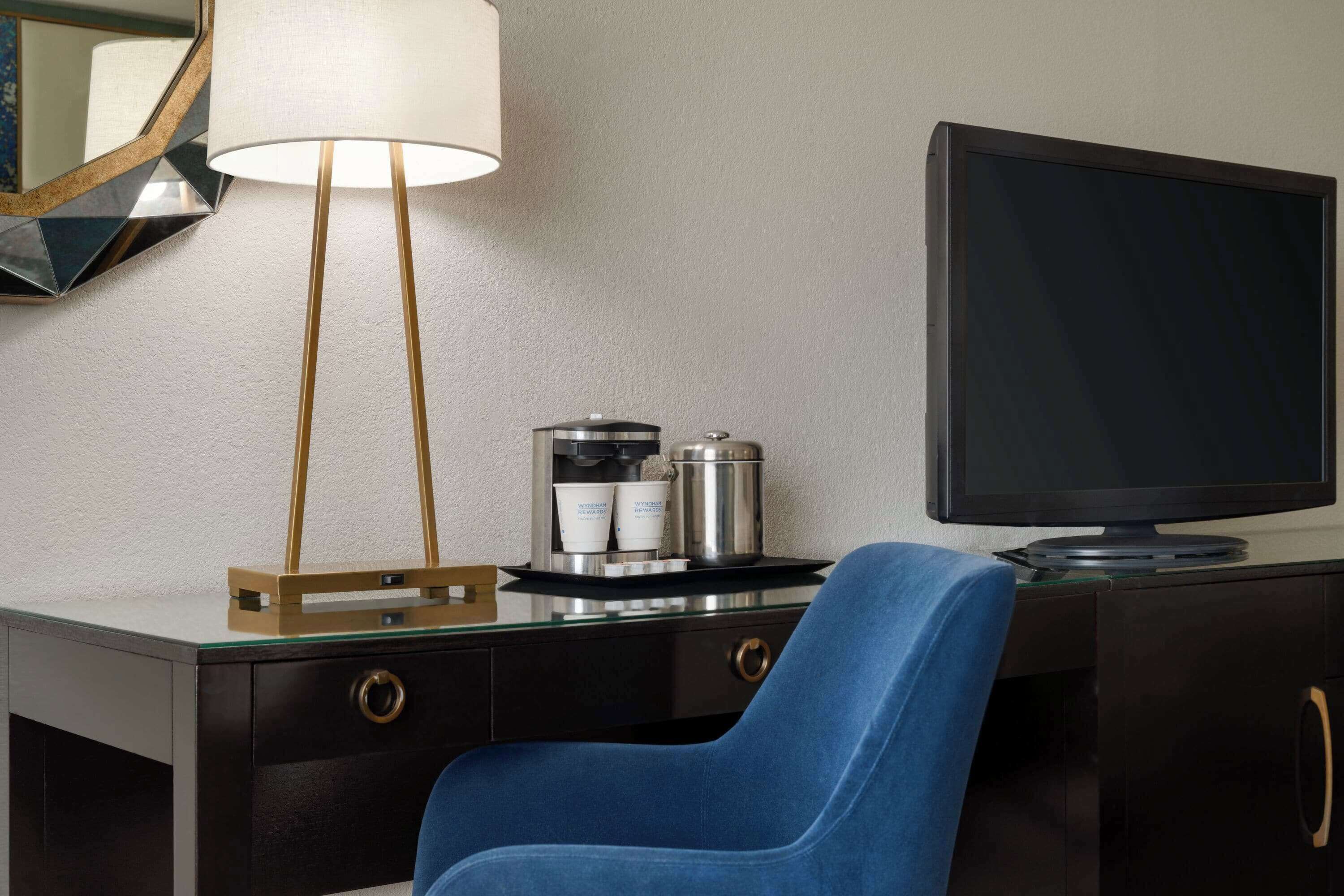 premium bedding, desk, laptop workspace, blackout curtains