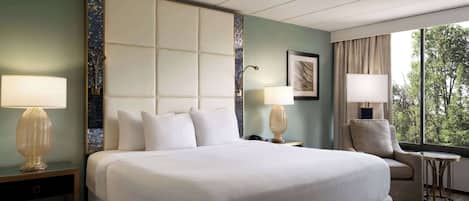 Premium bedding, desk, laptop workspace, blackout curtains