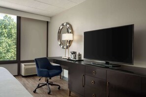 Premium bedding, desk, laptop workspace, blackout curtains