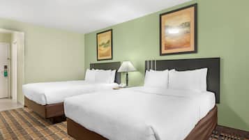 Desk, laptop workspace, blackout drapes, iron/ironing board