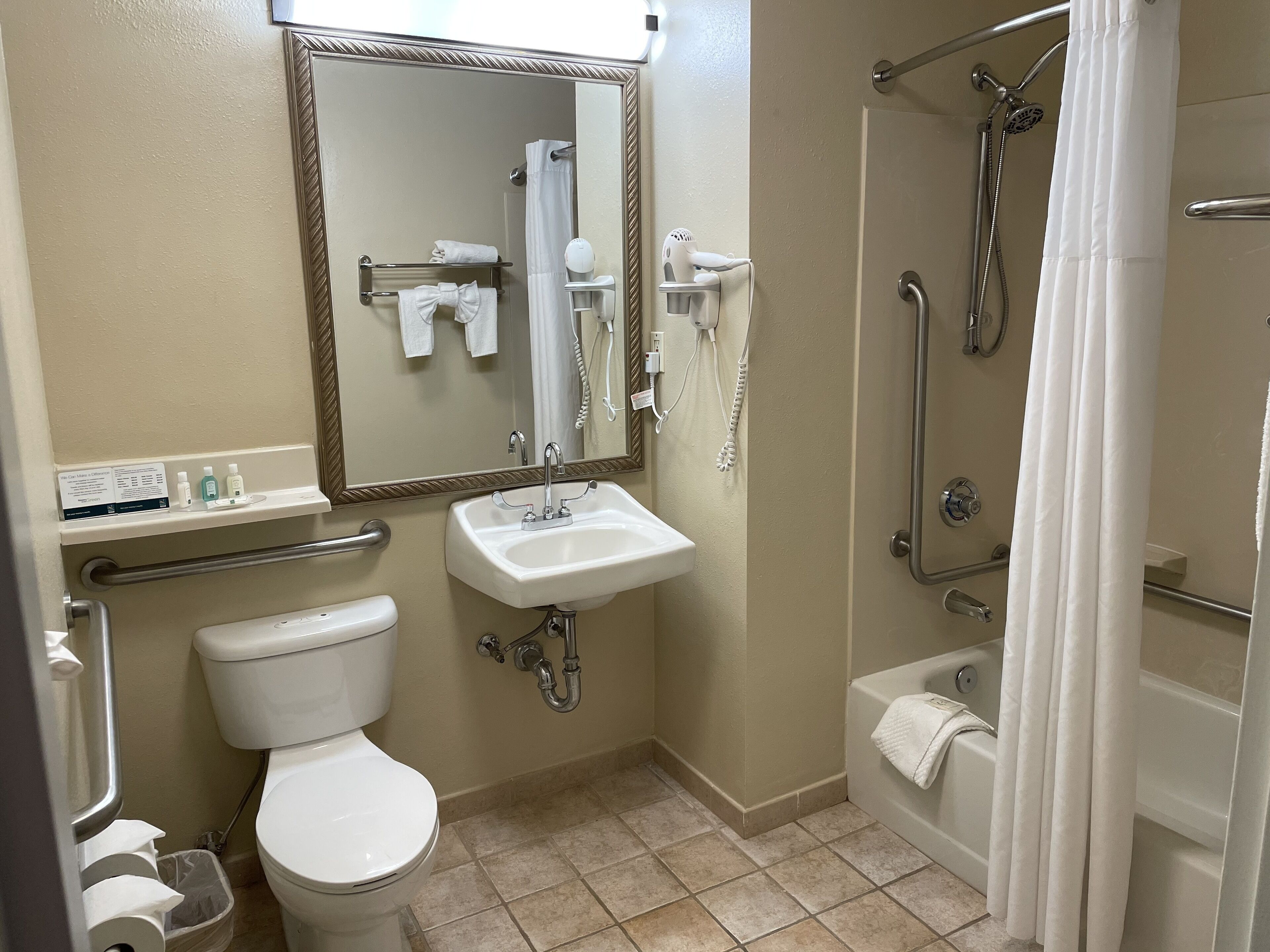 combined shower/bathtub, free toiletries, hair dryer, towels
