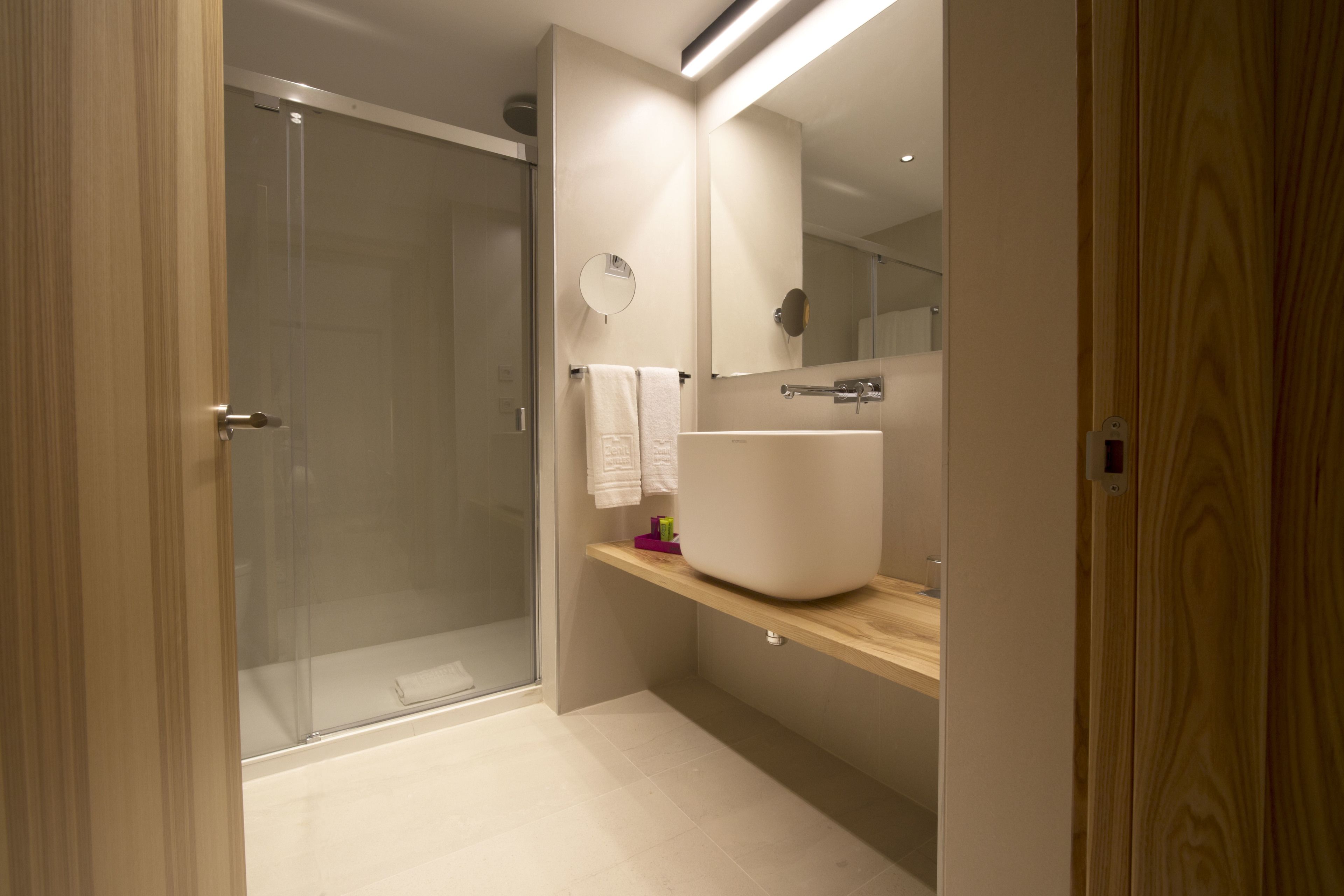 eco-friendly toiletries, hair dryer, towels