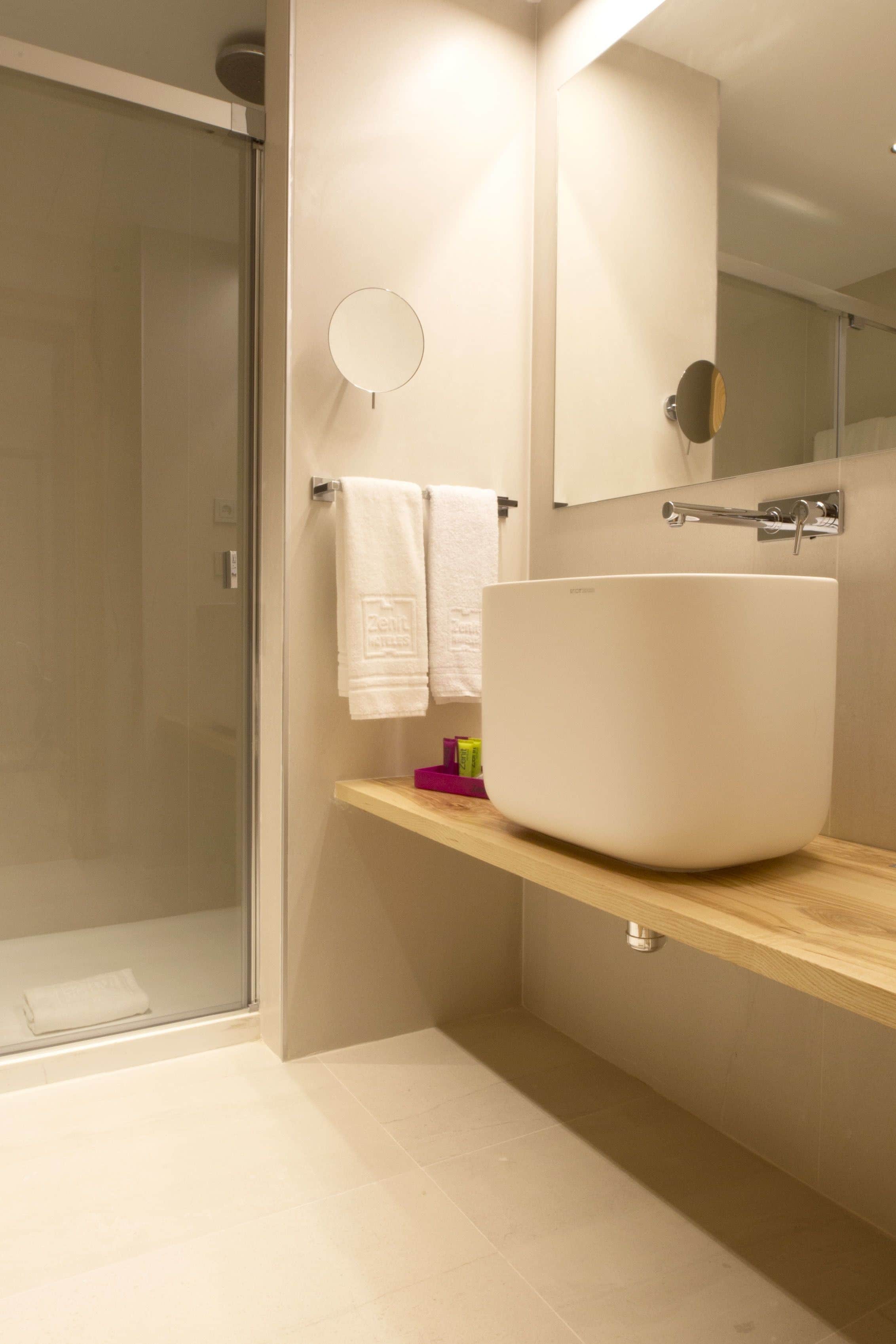 eco-friendly toiletries, hair dryer, towels