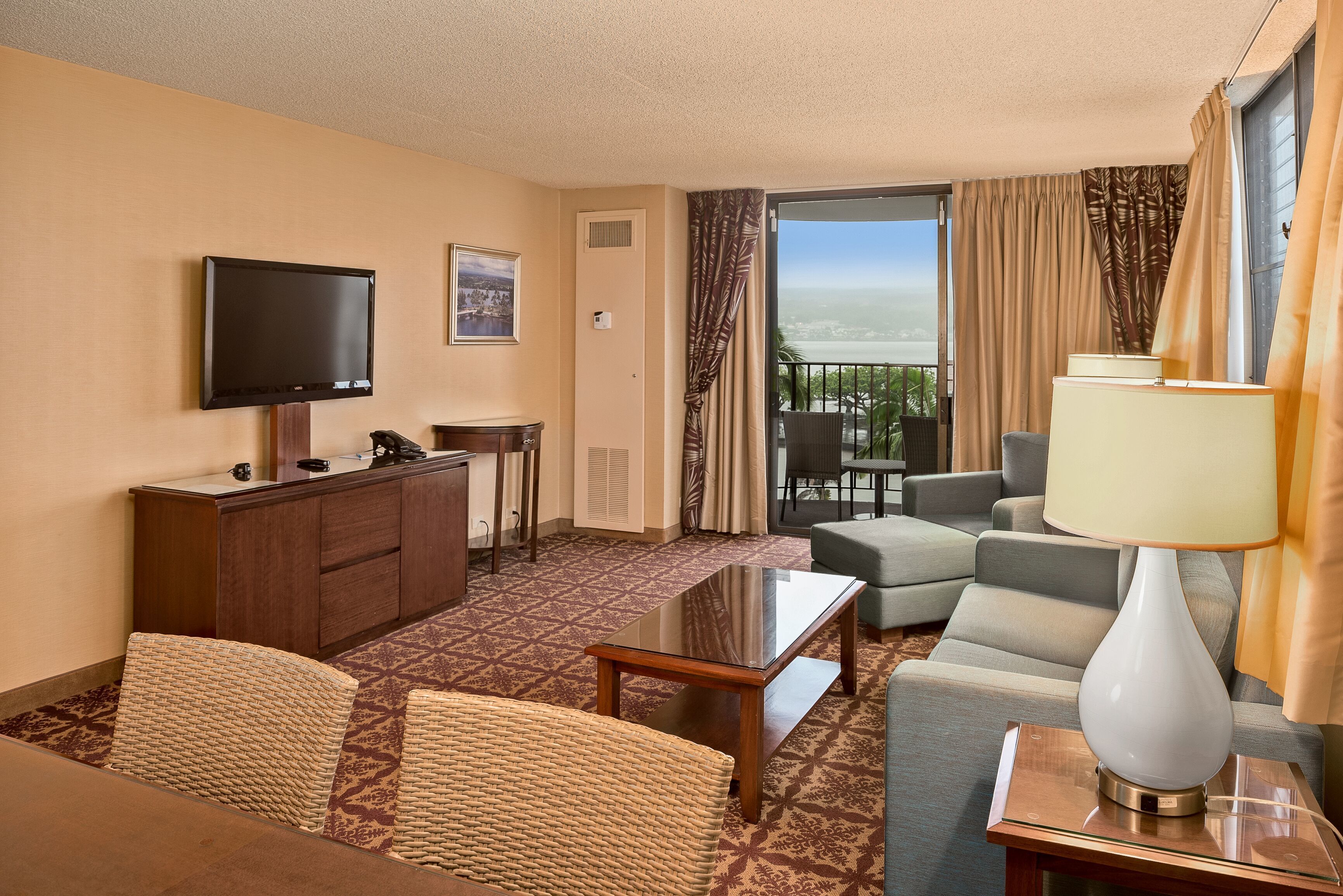 suite, 1 bedroom, ocean view | living area | 32-inch flat-screen tv with cable channels, tv