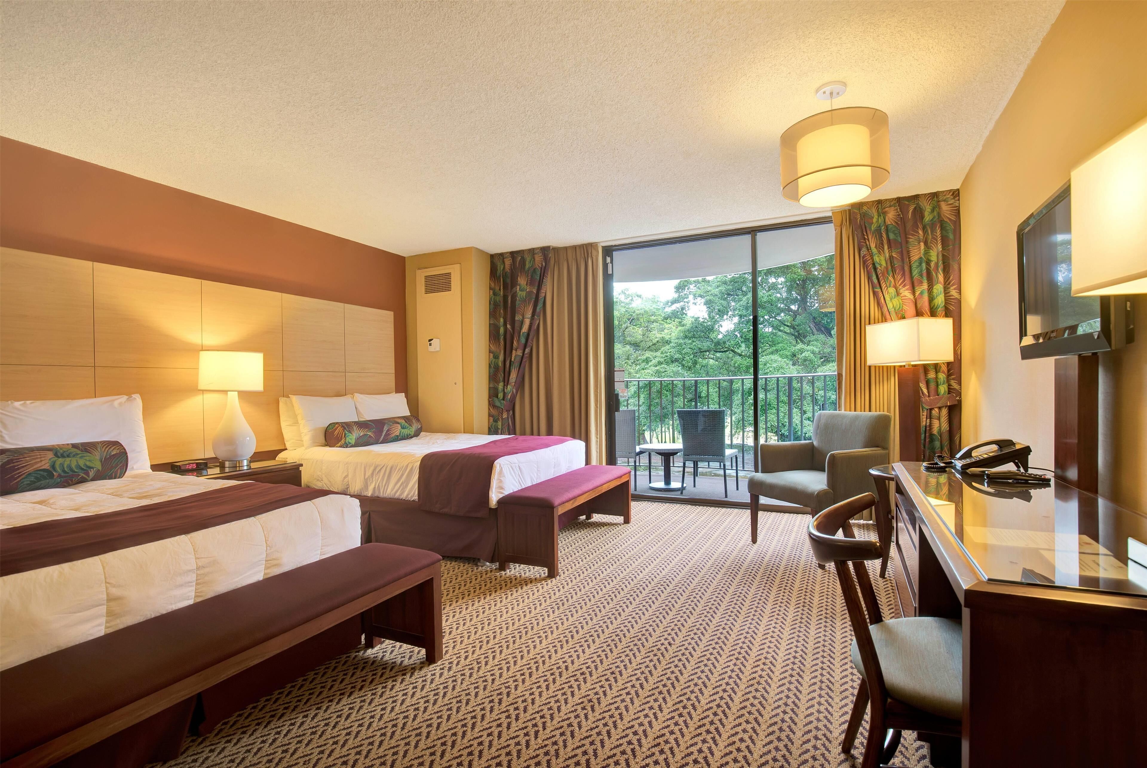 desk, laptop workspace, iron/ironing board, rollaway beds