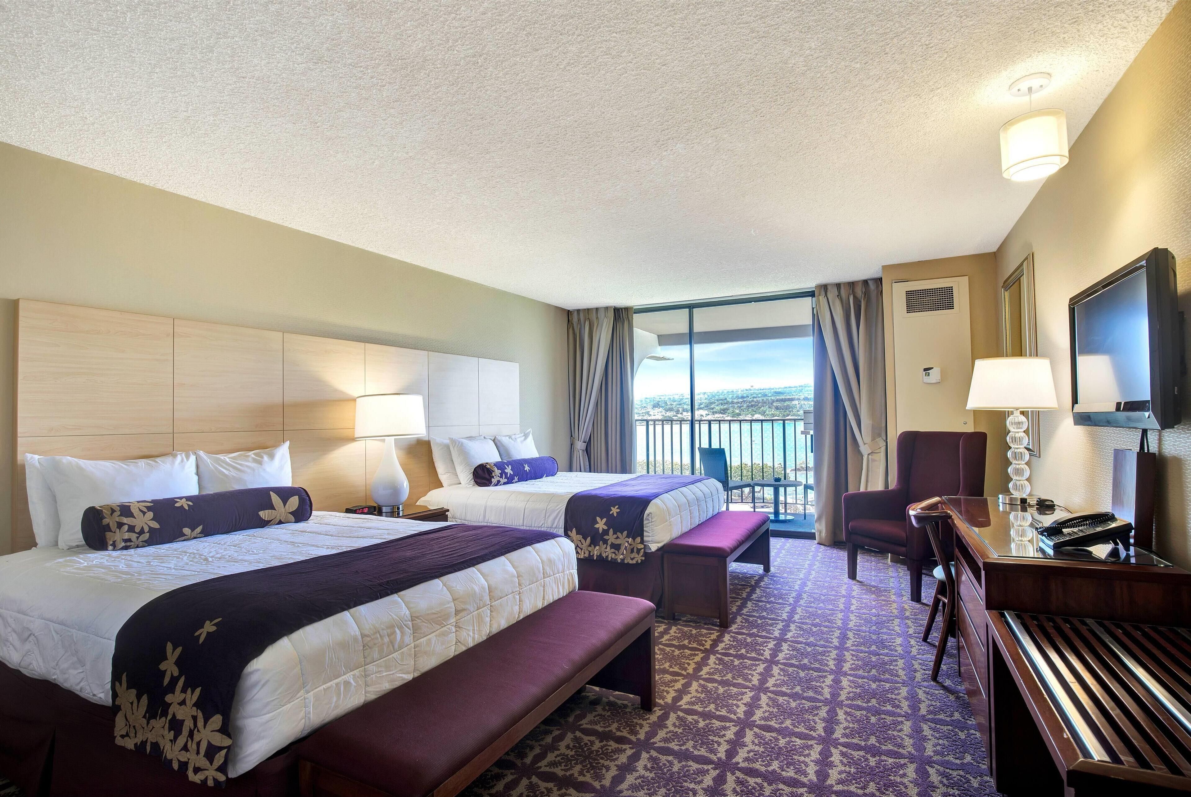 suite, 2 queen beds, non smoking, oceanfront (1 bedroom, banyan view) | desk, laptop workspace, iron/ironing board, rollaway beds