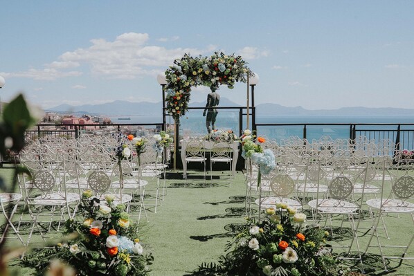 Stunning ocean views and mountain vistas set the scene for a romantic wedding ceremony.