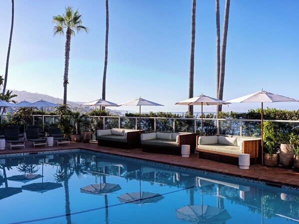 Outdoor pool, free pool cabanas, pool umbrellas