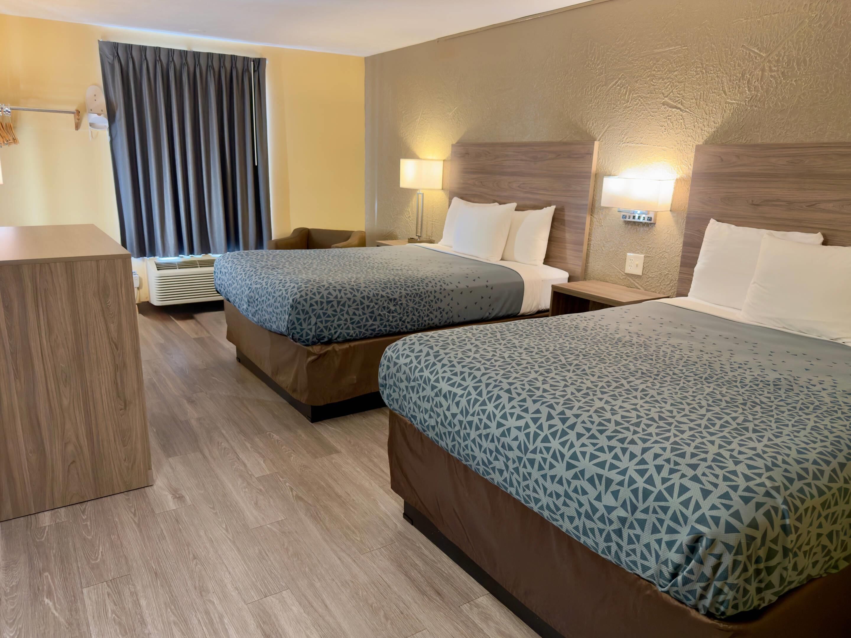 Standard Room, 2 Queen Beds, Non Smoking | Free cribs/infant beds, rollaway beds, free WiFi, bed sheets