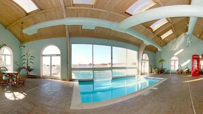 Indoor pool, outdoor pool, open 9 AM to 11 PM, sun loungers