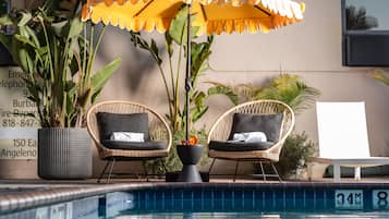 Outdoor pool, pool umbrellas, pool loungers