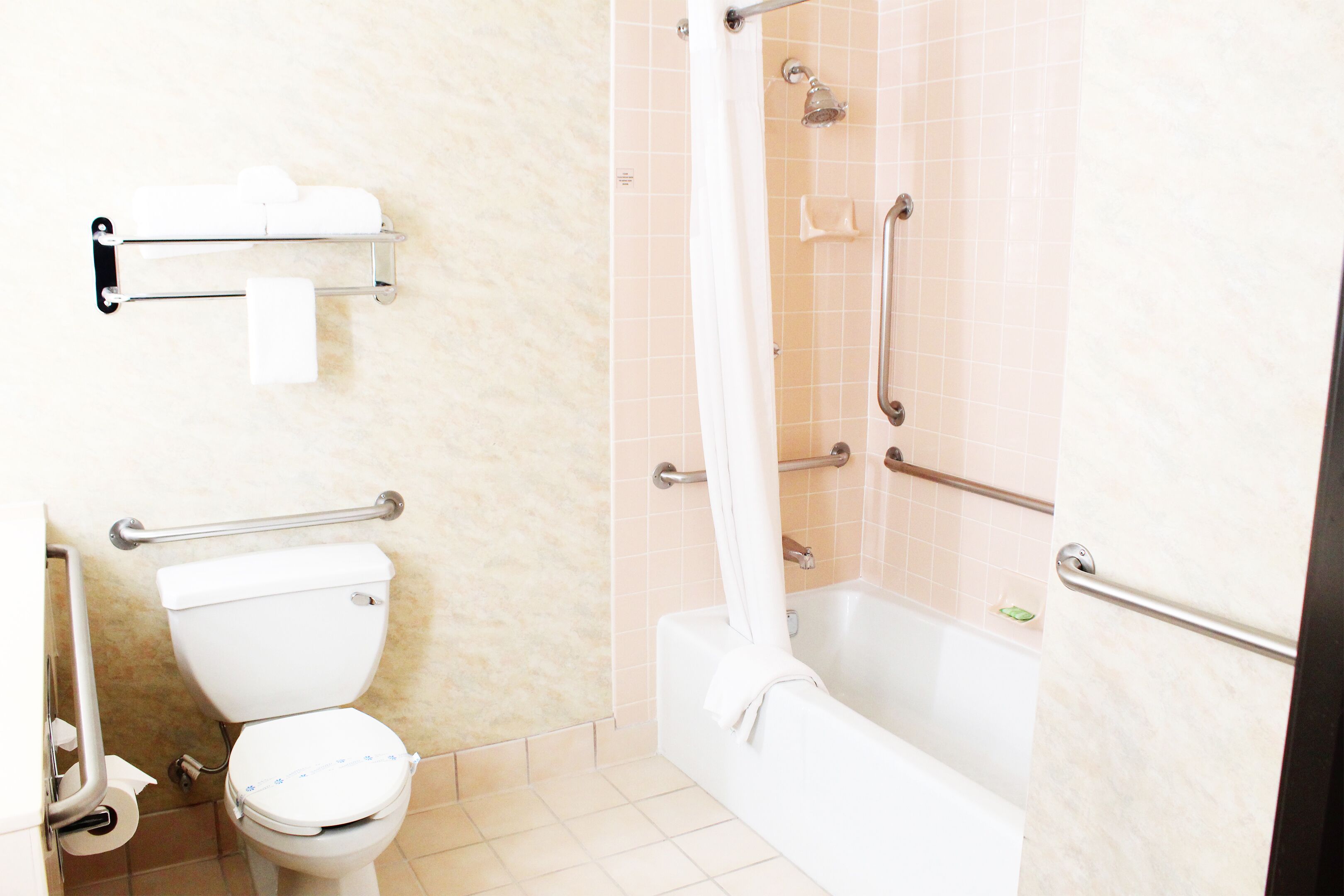 comfort room, 1 queen bed | bathroom | eco-friendly toiletries, hair dryer, towels