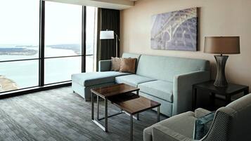 Executive Suite, 1 Bedroom, Non Smoking, River View | Living area | 49-inch Smart TV with cable channels, TV