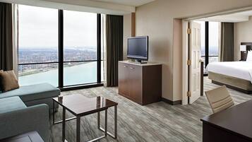 Junior Suite, 1 Bedroom, River View | In-room safe, desk, laptop workspace, iron/ironing board