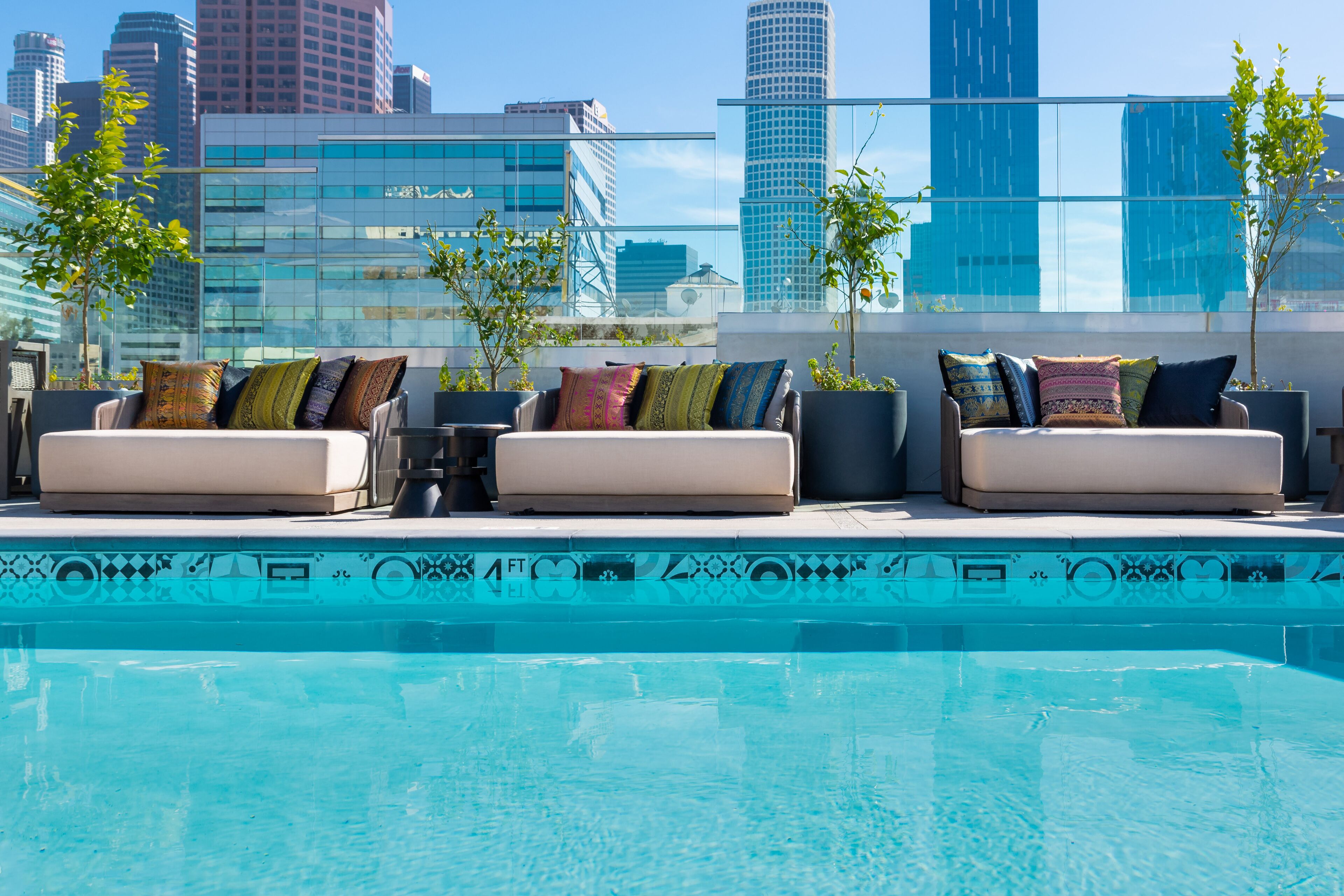 Outdoor pool, open 6:00 AM to 8:00 PM, free cabanas, pool umbrellas